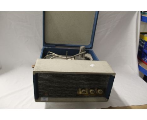 A portable record player by Perio - does need some TLC but has a great vintage 1960's look to it - viewing is recommended
