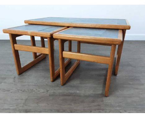 the tables tile topped the largest table 39cm high x 84cm long x 44cm depth