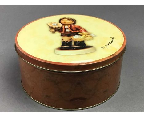 along with three others, two similar, a salt and pepper shaker and a Hummel bracelet