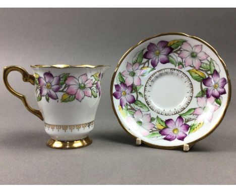 including two hand painted saucers in the Imari and cobalt blue pattern, featuring floral displays, in the manner of Bloor De