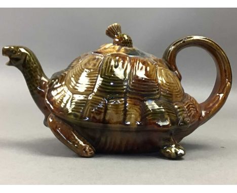 the tea pot with detachable lid and loop handle, the bottle painted with a bird, fish and flowersthe teapot 20cm long, the bo