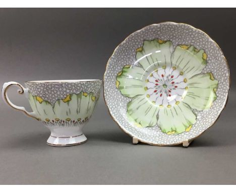 comprising six cups, saucers and side plates, biscuit plate and cream jugQty: 20