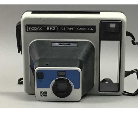 including a Kodak folding 'Brownie' Six-20 model', a Kodak EK2 model, a Canon AE1 model and accessories 