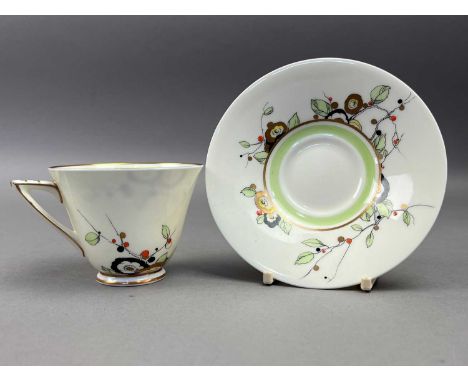 comprising six cups, saucers and side plates, biscuit plate, sugar and cream, decorated with stylised floral designs in colou