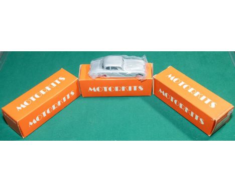 3 unmade MOTORKITS white metal model car kits. An EK1 1959 Volvo PV544. An EK2 1951 Bugatti 101 Coupe. Plus a MK20 1930 Bentl