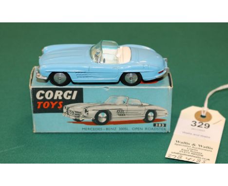 Corgi Toys Mercedes-Benz 300SL Open Roadster (303). An example in light blue with white interior, smooth spun wheels with bla