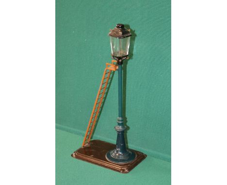 Bing early 20th century metal and Tinplate street lamp, green metal lamp with tin ladder and base. Glass dome is intact and o