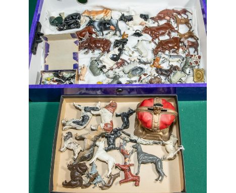 A quantity of lead farm animals and dogs and other items. Includes, cows in various poses and colours, bulls, ducks, sheep, G