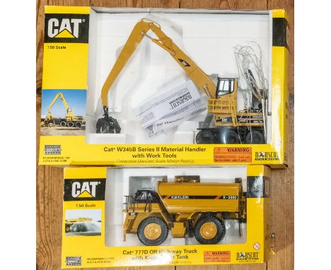 2 Cat 1:50 Scale Construction vehicles. Cat W345B Series 11 Material Handler with work tools, (Possibly been displayed) and a