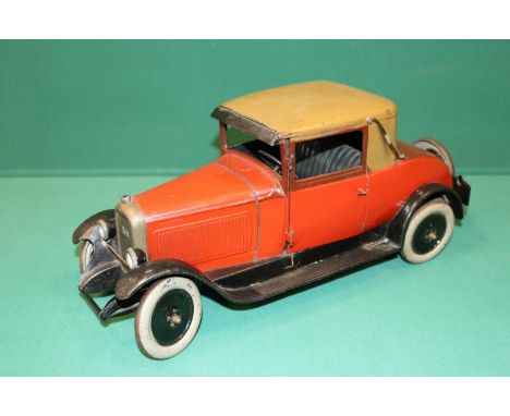 A rare Andre Citroen 1930s, C6 Hard top Coupe tin-plate clock work Car. These toys were produced by the Citroen company and s