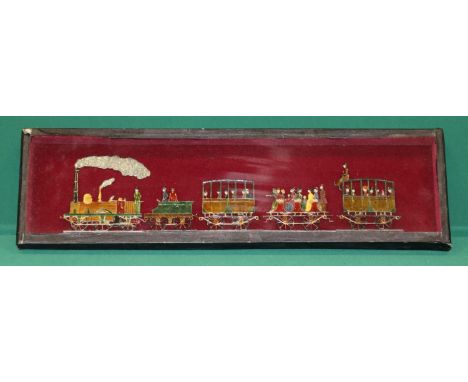 A rare mid 1800's German style "flat" tender locomotive and coach set. A 2-2-2 locomotive with a 4 wheeled tender and an encl