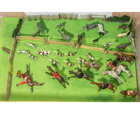 Britains Hunting scene diorama. Bespoke and well made, comprising 8 mounted huntsman, 1 on foot, 12 dogs,1 Fox, mules, sheep,