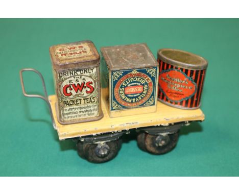 A tinplate station hand cart with 3 miniature size tins, by an unknown maker. Looks to be "O" gauge in scale, Possibly 1930s.