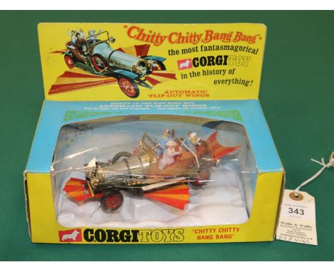 Corgi Toys Chitty Chitty Bang Bang (266). 1967 issue with original figures and both front and rear wings. Boxed 7/10 with inn