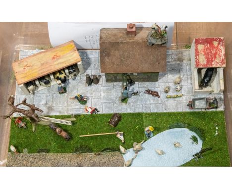 Britains farm yard diorama set. Bespoke and well made, with a wooden farm house, wooden cow shed, and a wooden pig stye. Ther