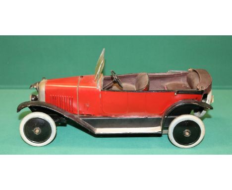 Andre Citroen B2 Torpedo open top tin-plate clockwork  car. These toys were produced by the Citroen Company and sold in their