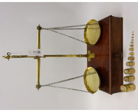 Set of late 19th century brass Chemists balance Scales, beam stamped Gatchell & Sons, on mahogany single drawer base & a set 