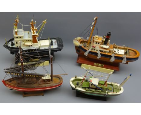 Scale model of a Tug and vessel Sanson, both named on fixed bases, and two other models of Fishing boats, H33cm max, (4)   Co