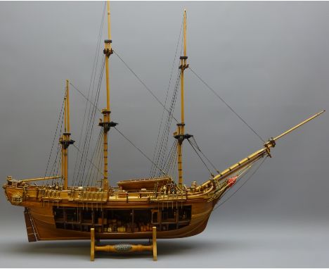 Wooden plank on frame 1:46 scale kit model of HMS Bounty, de-rigged with cut-away side showing hold, Captain's cabin etc, on 