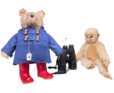 Paddington Bear, Steiff Monkey, and pair of Swarovski binoculars.
