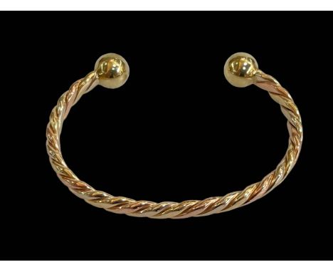 9 carat gold rope twist solid bangle.
