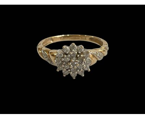 Diamond cluster 9 carat gold ring, size P.