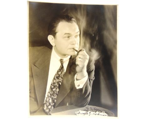 AUTOGRAPHS - EDWARD G. ROBINSON (ROMANIAN-AMERICAN, 1893-1973), ACTOR  a black and white portrait photograph, inscribed and s