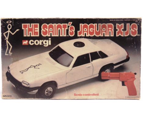 A CORGI THE SAINT'S JAGUAR XJS  white plastic, with sonic control, complete with pistol shaped controller and instruction she
