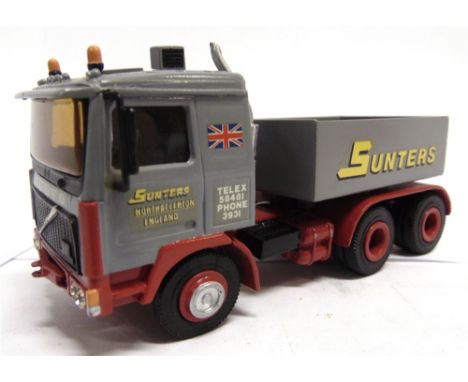 A WHITE METAL MODEL OF A VOLVO HEAVY HAULAGE TRACTOR 'SUNTERS'  generally good condition (ballast box detached), unboxed.