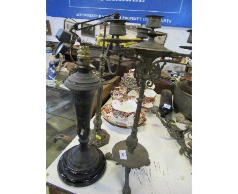A 19th century style table lamp base, together with two candelabrums