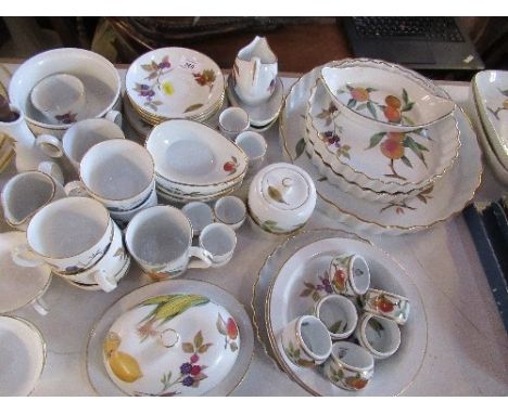 A large collection of Royal Worcester Evesham including flan dishes, cake plates, etc.