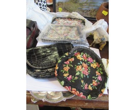 3 tapestry evening bags, together with a black leather skin example