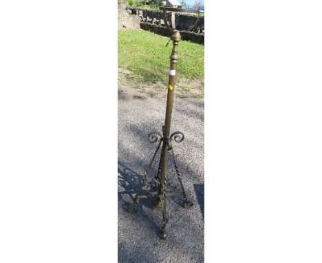 A telescopic oil lamp base stand, raised on four supports height 49.5ins