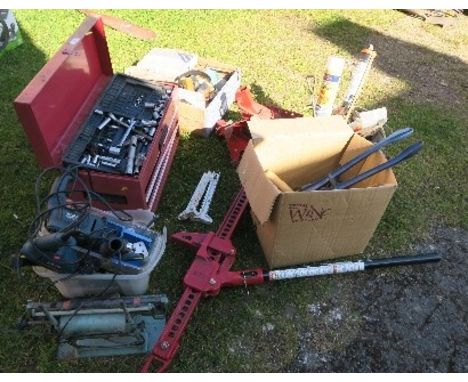 A collection of tools, tool box, jack, drills, etc.