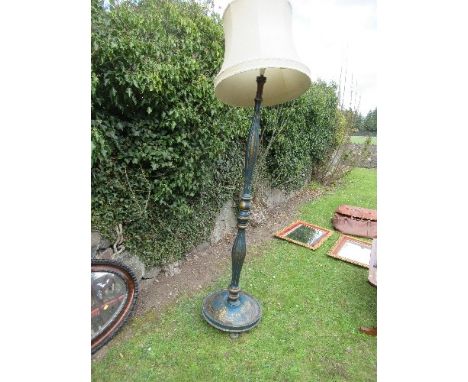 A Japanese style lacquered standard lamp, decorated with foliage and figures to a blue ground, the fluted and knopped column 
