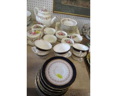 A Royal Worcester part tea service, Bournemouth pattern, together with six Royal Worcester Regency pattern tea cups, saucers 