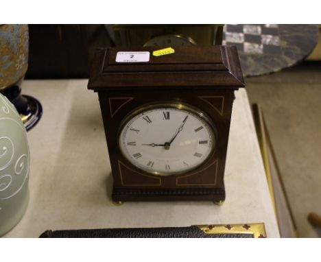 A Comitti of London mahogany cased mantel clock 