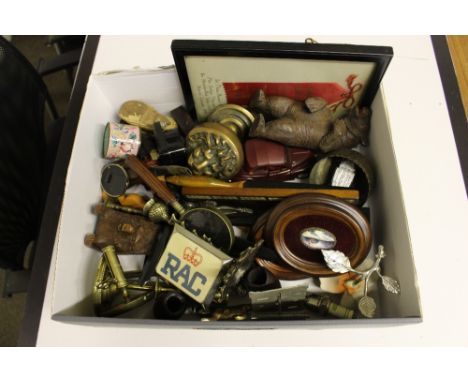 A box of various sundries to include a carved Black Forest bear; a car clock; a cribbage board; brass candlestick; wooden pip