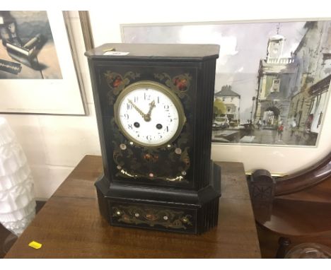 A late 19th Century French two hole mantel clock contained in ebonised and brass inlaid case 