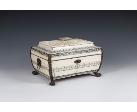 An Anglo-Indian Vizagapatam ivory and penwork work box19th century, sarcophagus form, decorated with ebonised bands of scroll