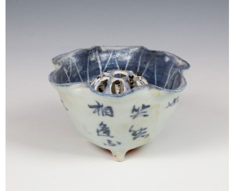 An unusual Chinese blue & white porcelain lotus shaped bowl, Nanking Cargo (1752), the inner bowl with central rising stick f