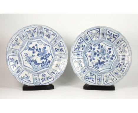 Two Chinese porcelain kraak blue and white dishes from the Hatcher Cargo, mid 17th century, Wanli period, deeply dished with 