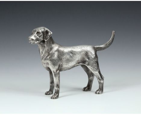 A modern solid silver model of a hound dog Albert Edward Jones, Birmingham 1973, 5½in. (14cm.) long, weight 12.5 tr.oz.* Cond