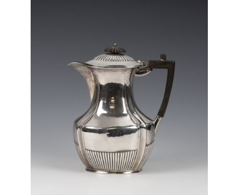 An Edwardian silver coffee pot Henry Stratford, Sheffield 1902, of canted rectangular form with part reeded decoration, ebony