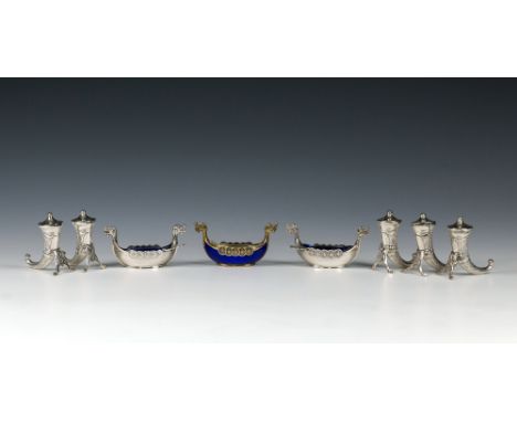A collection of Norwegian sterling silver condiments comprising two pairs of cornucopia salt & pepper cruets and a single cor