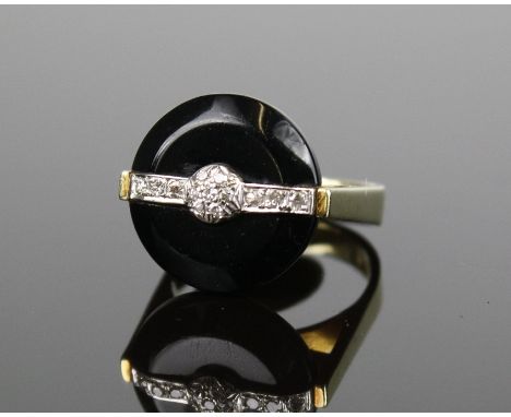 An Art Deco style 14ct yellow gold, black glass and diamond ringthe bevelled, button form black glass beneath a diamond set b