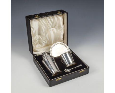 A cased George V silver Art Deco four piece cocktail set Barker Brothers Silver Ltd., Birmingham 1945, cocktail shaker of tap