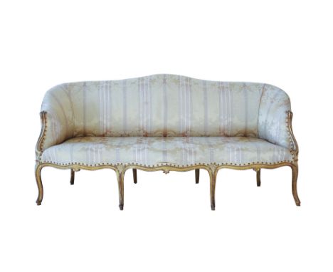 An elegant 18th century Hepplewhite carved, painted and parcel gilt showframe sofa, the serpentine back over a serpentine fro