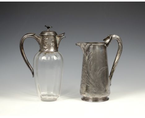An Art Nouveau Gallia Christofle silver plate and glass claret jug the hinged lid with flower finial on a floral decorated co