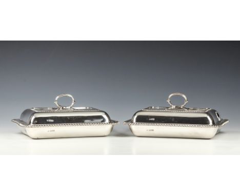 A pair of Edwardian silver covered entree dishesWilliam Hutton &amp; Sons, London 1907 and 1908, of rectangular form with gad